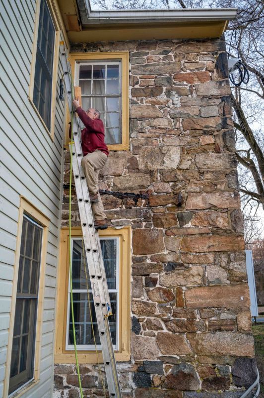 Our team working on Siding Service projects in Lake Orion, MI